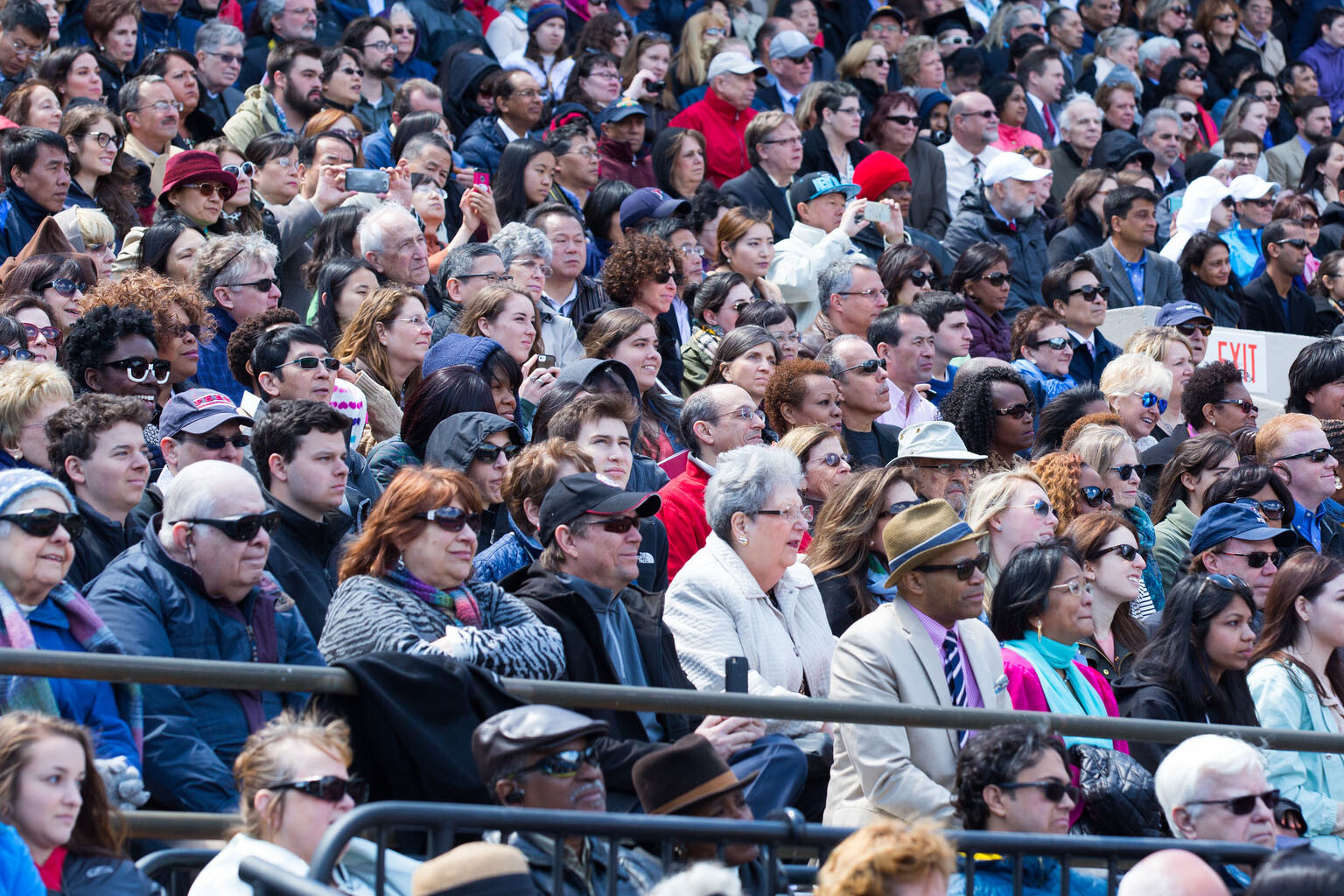 guests and families in Franklin Field stadium seating at Commencement